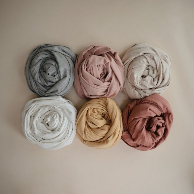 Mushie Draagdoek Blush koop je bij Babywinkel